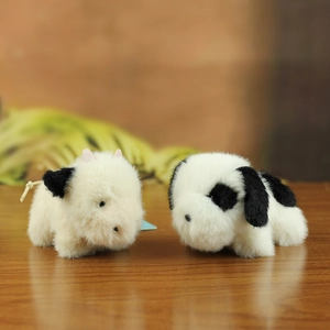 Cute black and white plush puppy hanging dolls made of soft fluffy material for gifts