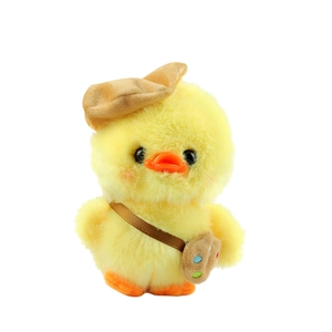 Cute yellow plush duck toy with brown beret and palette bag on a clean white background