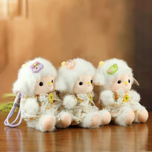 Three cute plush sheep dolls wearing floral lace dresses, used as bag charm pendants