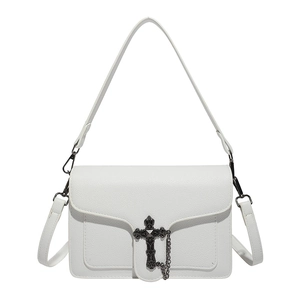 White faux leather crossbody bag with punk cross pendant and decorative chain detail