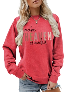 Detail of red crewneck sweatshirt featuring make HEAVEN crowded artistic slogan print
