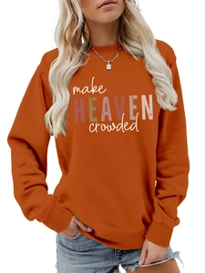 Detail of ribbed cuffs and make HEAVEN crowded print on orange women's sweatshirt