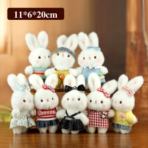 Adorable plush bunny charm collection with varied outfits in diverse colorful styles