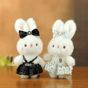 Cute white bunny plush keychain set with elegant dress and camellia bow accessories