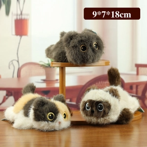 Three realistic cat plush toys in grey, calico, and siamese colors measuring 9x7x18cm