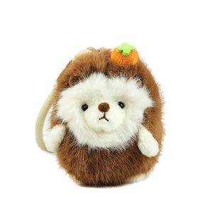 Cute hedgehog plush keychain with a small orange fruit on head, soft brown and white fur