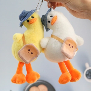 Cute plush duck keychains in yellow and white with sun hats and toast crossbody bags