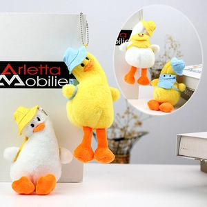 Cute plush duck keychain with mini sun hats and bags, set of yellow and white charms