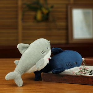 Detail of plush shark keychains showing soft fabric texture and sturdy metal rings