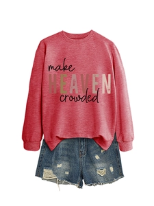 Detail of red crewneck sweatshirt with 'make HEAVEN crowded' text on heather fabric