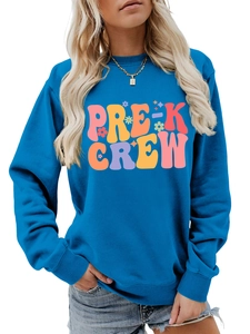 Detail of the bright blue sweatshirt showing the colorful Pre-K Crew puff print and floral design