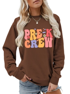 Detail of coffee brown Pre-K Crew sweatshirt with retro rainbow font and ribbed neckline