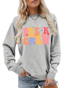 Detail view of the colorful PRE-K CREW print on a grey long sleeve casual sweatshirt