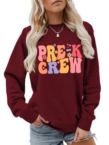 Detail of burgundy Pre-K Crew sweatshirt featuring ribbed neckline and cotton fabric texture