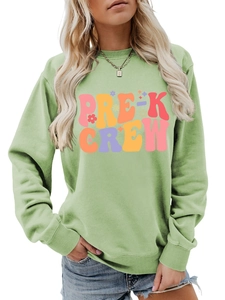 Detail of light green sweatshirt with colorful PRE-K CREW print and ribbed neckline