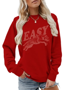 Detail view of the ribbed round neckline and vintage tiger print on the red cotton sweatshirt