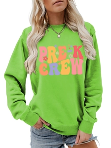 Detail view of the bright green crewneck sweatshirt with colorful PRE-K CREW floral print