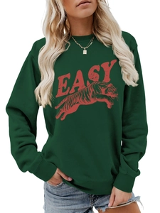 Close-up of vintage tiger print and red EASY lettering on green cotton sweatshirt