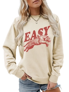 Detail of tiger print and red EASY lettering on cream crewneck sweatshirt
