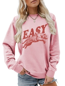 Close-up of the vintage red tiger print and EASY lettering on pink sweatshirt