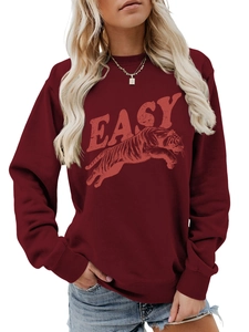 Detail of burgundy long-sleeve sweatshirt with Easy text and tiger graphic print