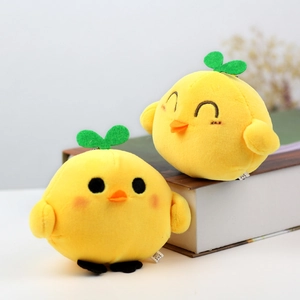 Cute yellow plush chick keychain with green leaf decor and varied facial expressions
