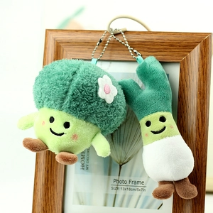 Cute plush vegetable pendants featuring broccoli and green onion with smiling faces