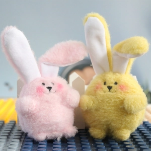 Cute mini rabbit plush dolls in pink and yellow for wedding events and gift favors