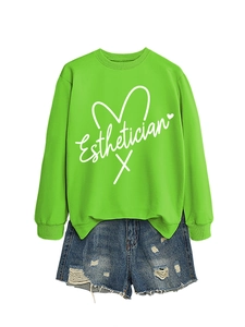 Detail of neon green Esthetician sweatshirt with heart graphic and white text