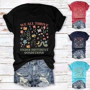 Detail view of colorful nature print T-shirts in black, red, navy, and sky blue colors