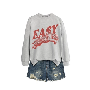 Women's grey sweatshirt with Easy tiger print and distressed denim shorts casual outfit