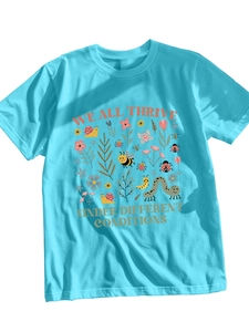 Detail of teal t-shirt with insects and flowers and WE ALL THRIVE UNDER graphic text