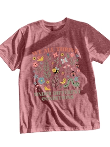 Detail of Heather Rose t-shirt showing colorful insect illustrations and floral prints