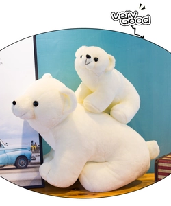 Detail of soft white polar bear plush set with mother and cub in polar theme
