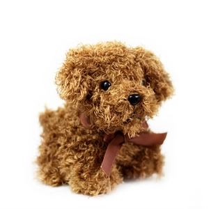 Adorable brown teddy dog plush toy with fluffy curly fur and a silk bow tie