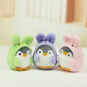 Three plush penguin charms in rabbit hoodies of green, lavender, and soft pink colors
