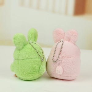 Detailed back view of plush bunny keychains in soft pastel pink and green colors
