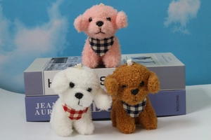 Trio of plush teddy dog keychains in pink, white, and brown with checkered scarves