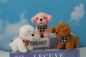 Set of three curly plush teddy dog pendants in white pink and brown with plaid scarves