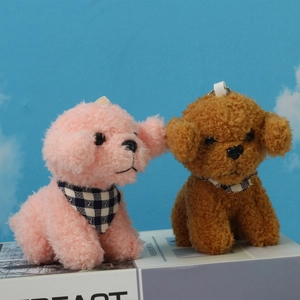 Cute pink and brown plush teddy dog charms with checkered scarves on white string