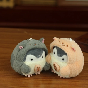 Cute penguin plush keychains in cat and fox costumes with sunflower seed detail