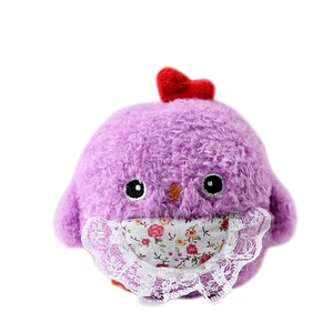 Cute purple plush chick keychain with red heart and floral lace bib on white background