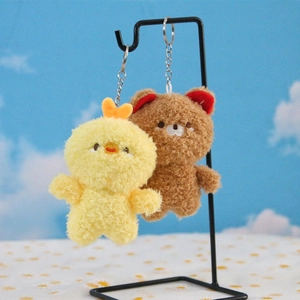 Plush animal keychains with fluffy yellow chick and brown bear featuring embroidery details