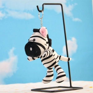 Cute zebra plush keychain with black and white stripes and silver metal ring accessory