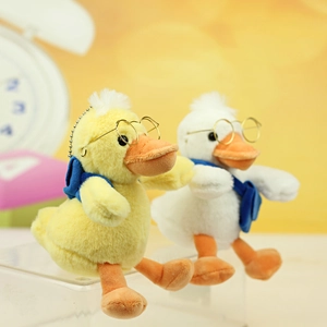 Cute plush duck doll with round glasses and mini blue backpack, yellow and white duo set