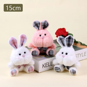 Three plush bunny keychains in white and pink with plaid bowties and 15cm size markers