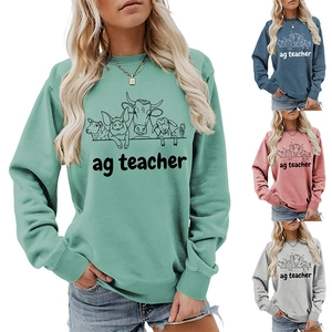 Detail view of Ag Teacher sweatshirt colors featuring animal farm graphics and soft fabric