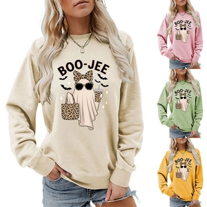Detail view of colorful Halloween sweatshirts featuring BOO-JEE leopard print ghost graphic