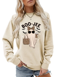 Close-up of Boo-jee ghost print with leopard bow and coffee on beige sweatshirt