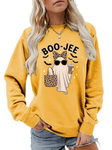 Close-up of Boo-Jee ghost print with leopard bow on a yellow cotton sweatshirt